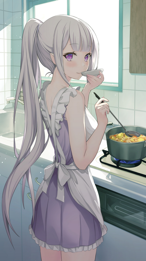 Emilia cooking food in a kitchen