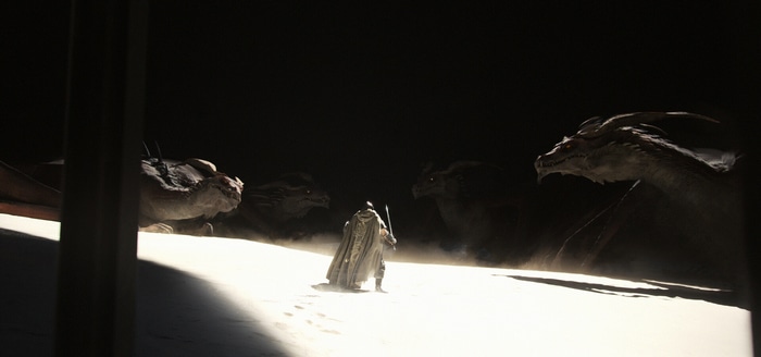 Knight facing multiple dragons in a dark fantasy setting