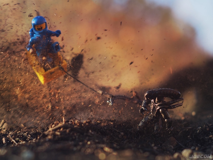 LEGO astronaut being pulled by a Xenomorph
