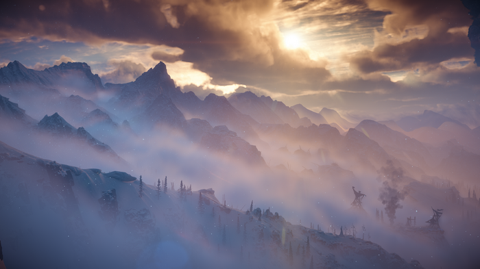 Horizon Zero Dawn Frozen Wilds snowy mountains at sunset