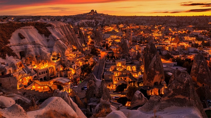 Cappadocia at sunset with fairy chimneys and cave dwellings