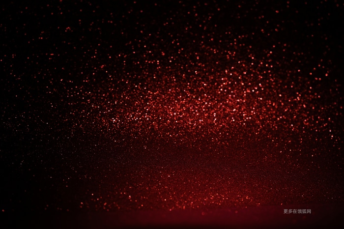 Abstract red bokeh lights on a dark background