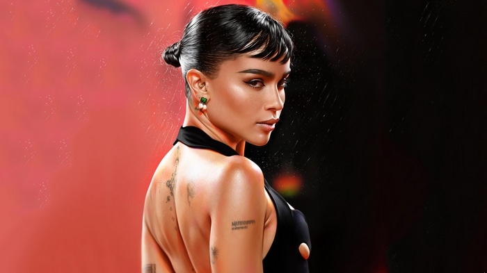 Zoë Kravitz in a black dress with tattoos