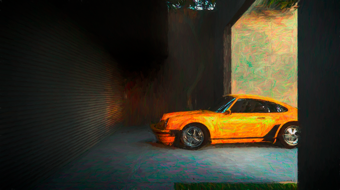 Orange Porsche sports car in a garage