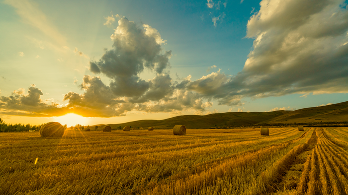 4K China Landscape with Hay Bales at Sunset