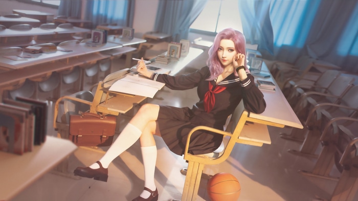 Schoolgirl with pink hair in a classroom