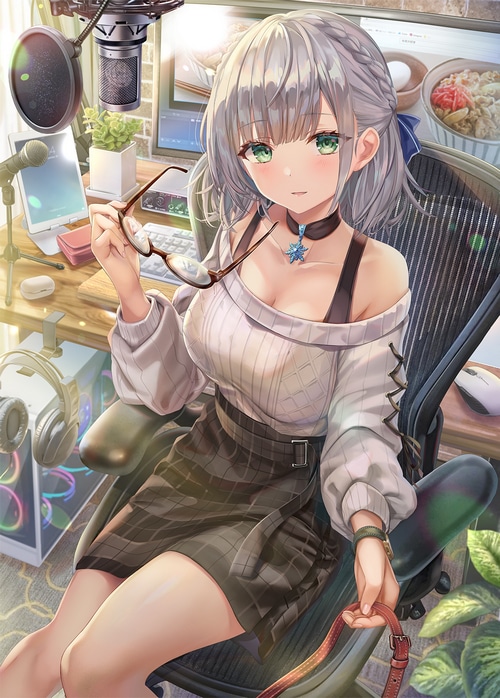 Shirogane Noel sitting at a desk with a microphone