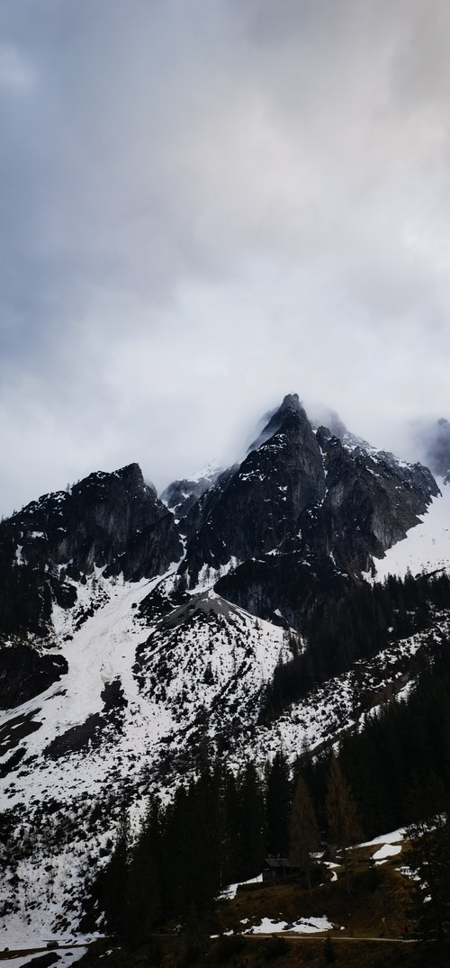 Snow-covered mountains and clouds in Austria