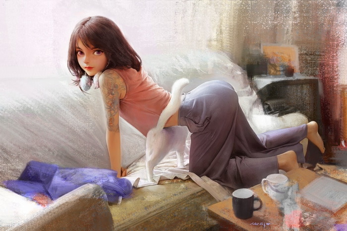 Girl with tattoo and cat on couch