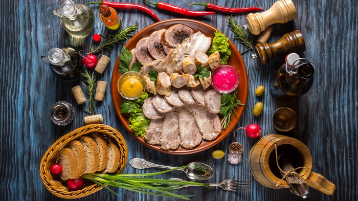4K still life of a meat platter with condiments