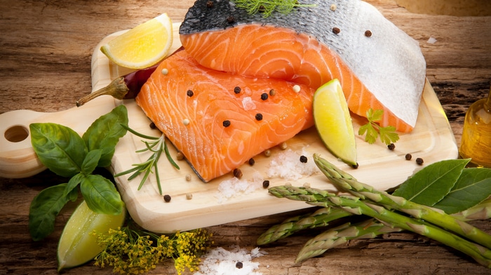 4K still life of salmon with ingredients