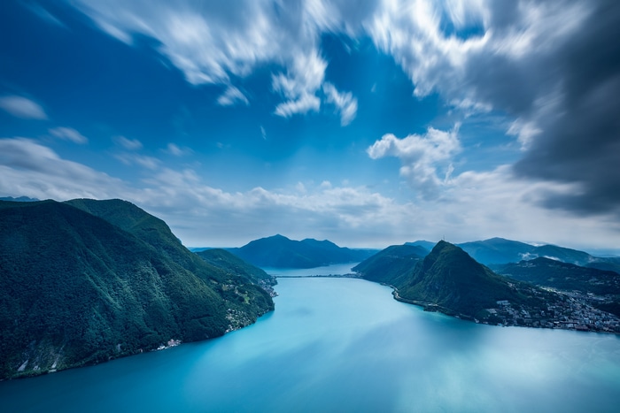 Long exposure of mountains and lake in Switzerland