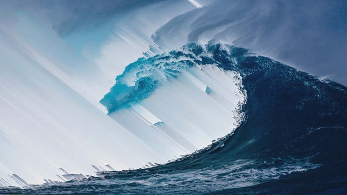Glitch art of a crashing ocean wave