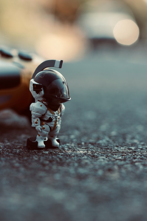 Death Stranding BB Pod Toy on Asphalt