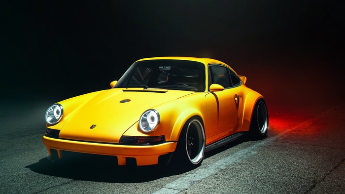 Yellow Porsche 911 parked at night