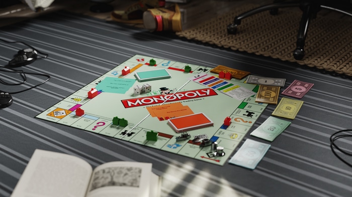 Monopoly board game with money and houses