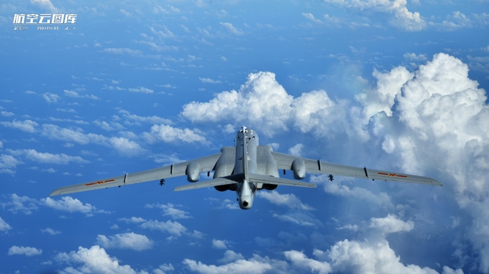 Chinese H-6 Bomber Flying Above Clouds