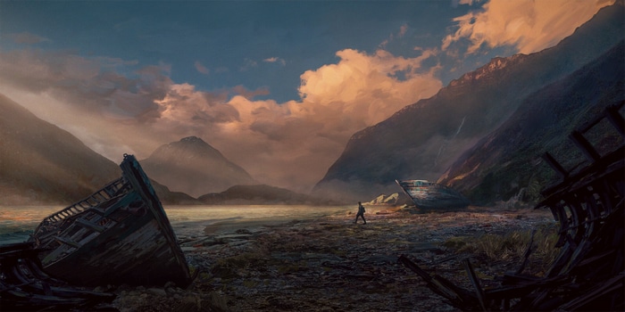 Shipwrecks on a rocky shore with mountains and clouds
