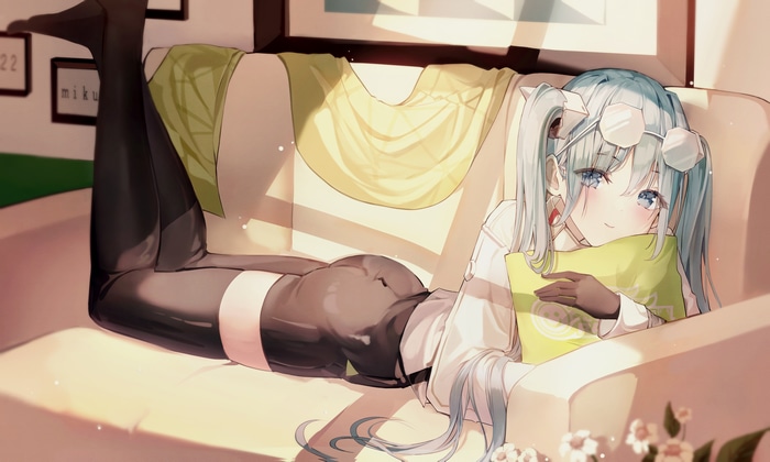 Hatsune Miku relaxing on a couch