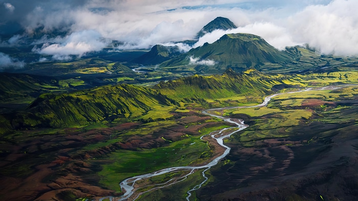 4K landscape of mountains and river with clouds