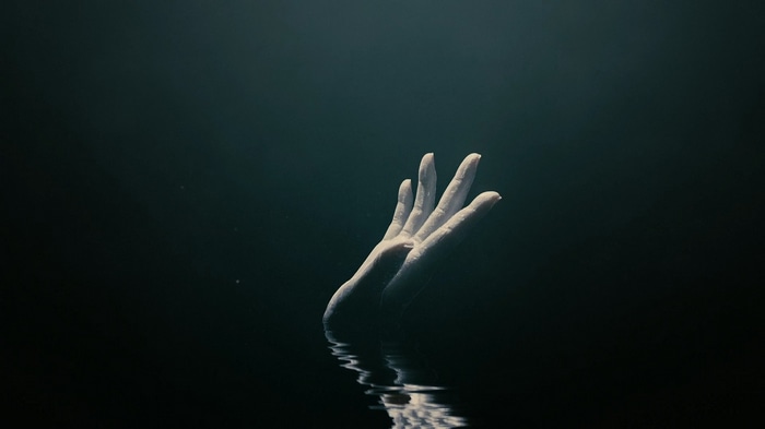 Westworld Hand Emerging from Dark Water