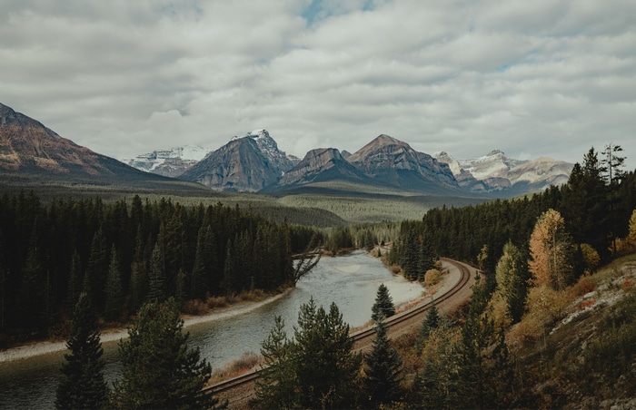 Canadian Rocky Mountains with River and Railway