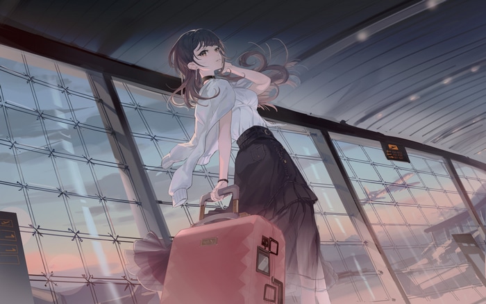 Girl with suitcase at the airport