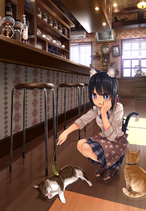 Cat girl playing with cats in a cafe