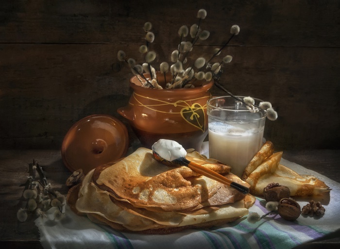 Still life with crepes and milk