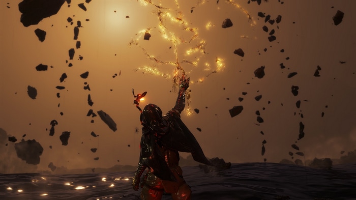 Death Stranding character with golden energy and debris