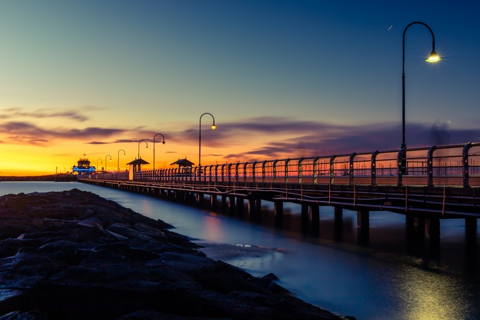 4K pier at dawn with sunset sky