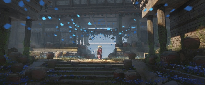 Monk in ancient ruins with blue petals falling