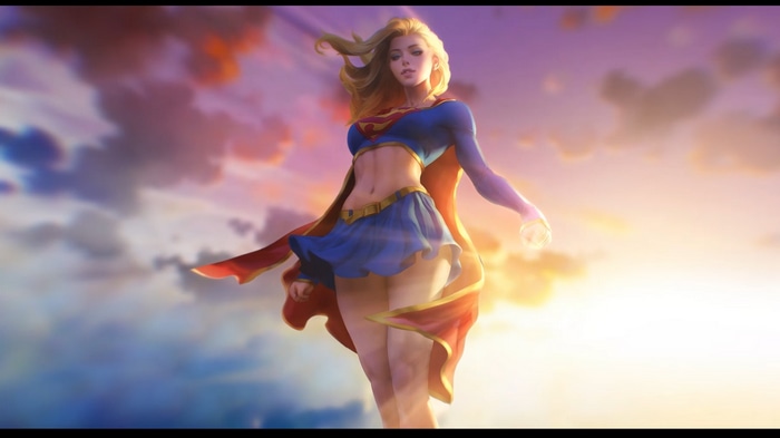 Supergirl in a blue skirt and red cape against a sunset sky