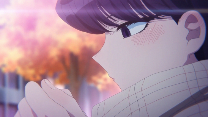 Shouko Komi blushing in front of autumn trees
