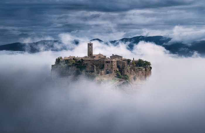 Civita di Bagnoregio, Italy, surrounded by clouds