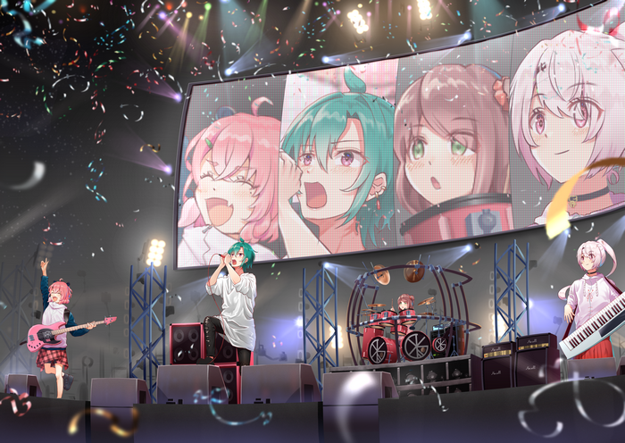Virtual YouTubers performing live on stage with confetti