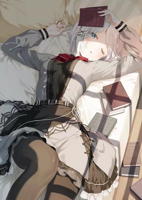 Siesta from The Detective is Already Dead sleeping with a book