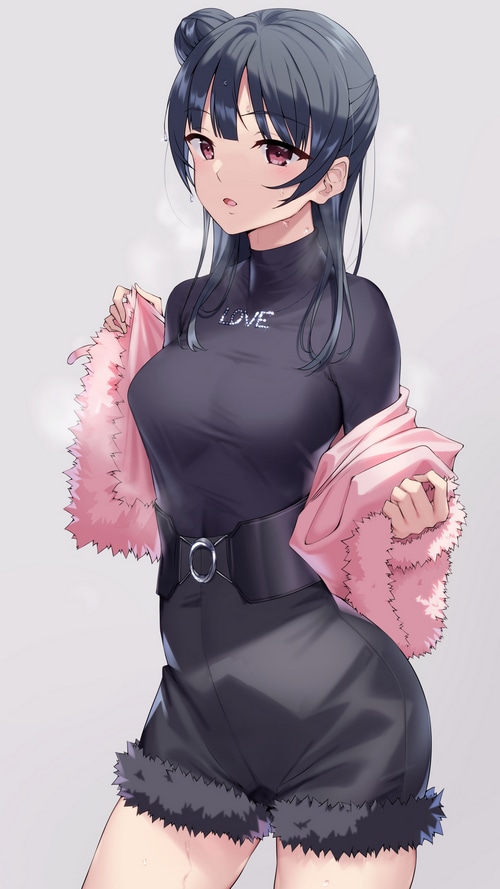 Tsushima Yoshiko in black outfit with pink jacket