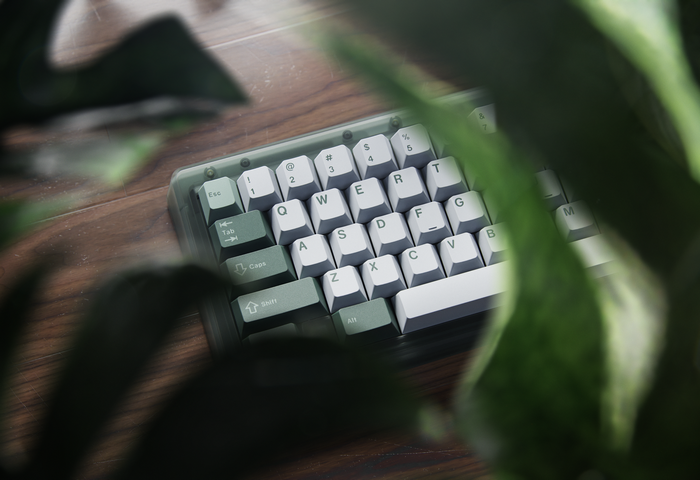GMK mechanical keyboard with green and white keycaps