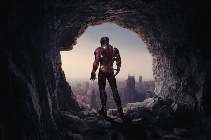 4K Iron Man in a cave overlooking a city