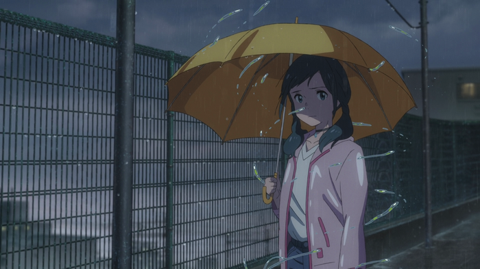 Hina Amano holding an umbrella in the rain