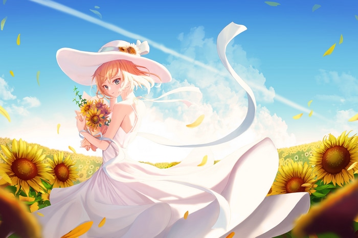 Girl in a white dress and hat in a sunflower field
