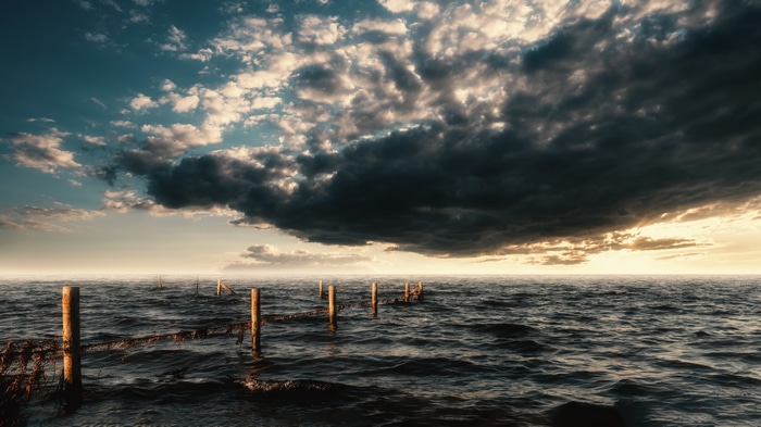 4K Dark Sea with Stormy Clouds and Sunlight