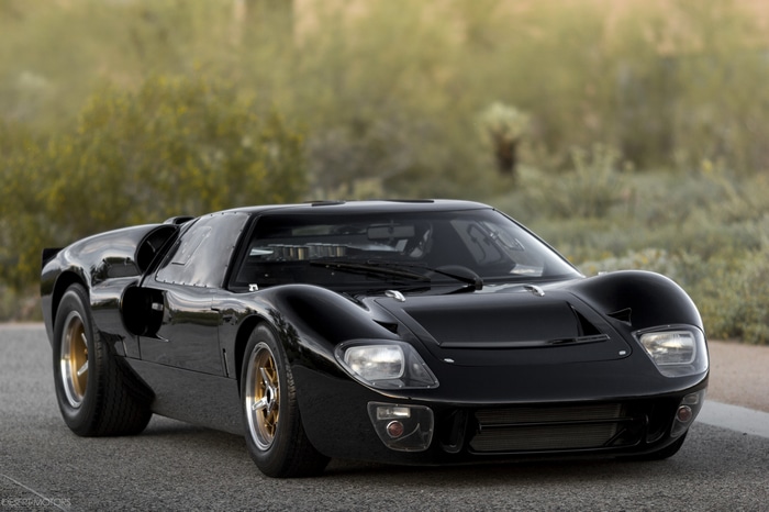 Black Ford GT40 race car in a desert setting