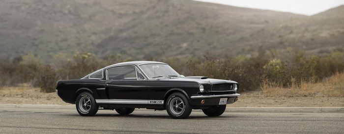 Black Ford Mustang Shelby GT 350 parked on asphalt