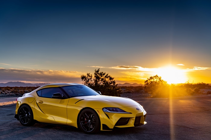 Yellow Toyota Supra at Sunset