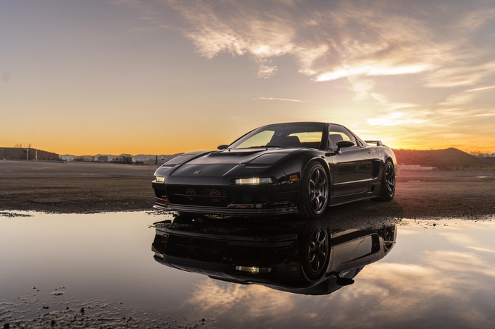 Black Honda NSX mk1 sports car at sunset