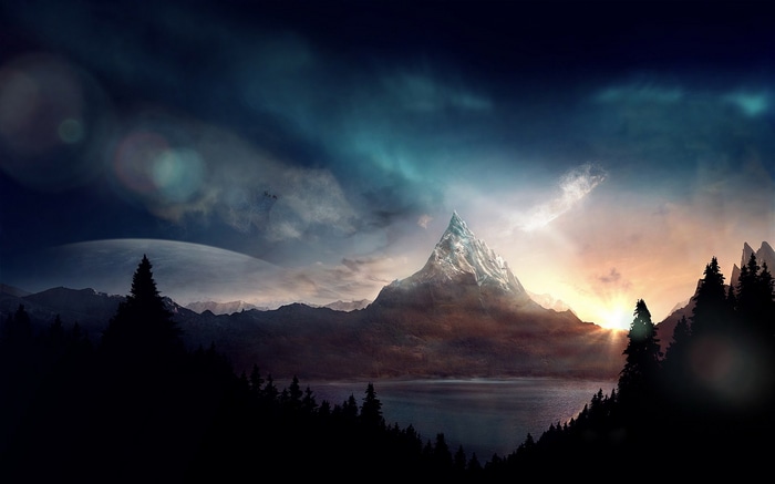 Mountain landscape with sunrise and lake