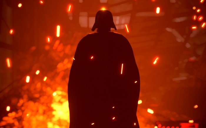 Darth Vader silhouette in front of orange flames