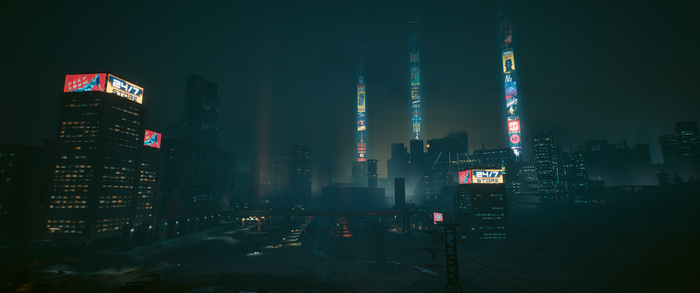 Cyberpunk 2077 Night City skyline with tall buildings and signs